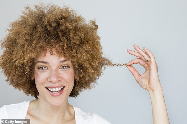 Another thing to consider when deciding how often hair should be washed is the texture, those with curly or multi-textured hair usually need to wash less frequently (file image)