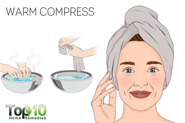 Use a warm compress to treat scalp sores